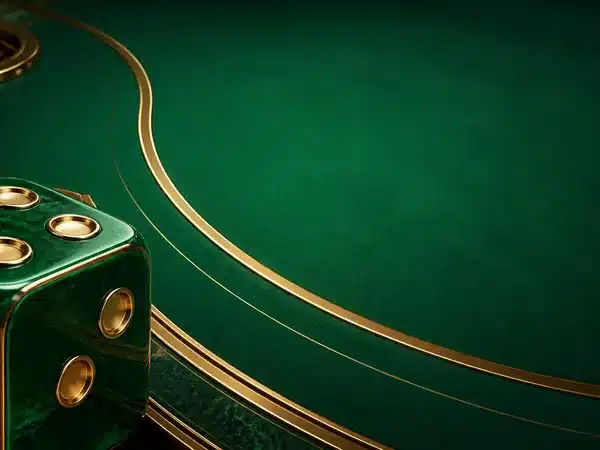 Decorative green die beside a green and gold gaming table